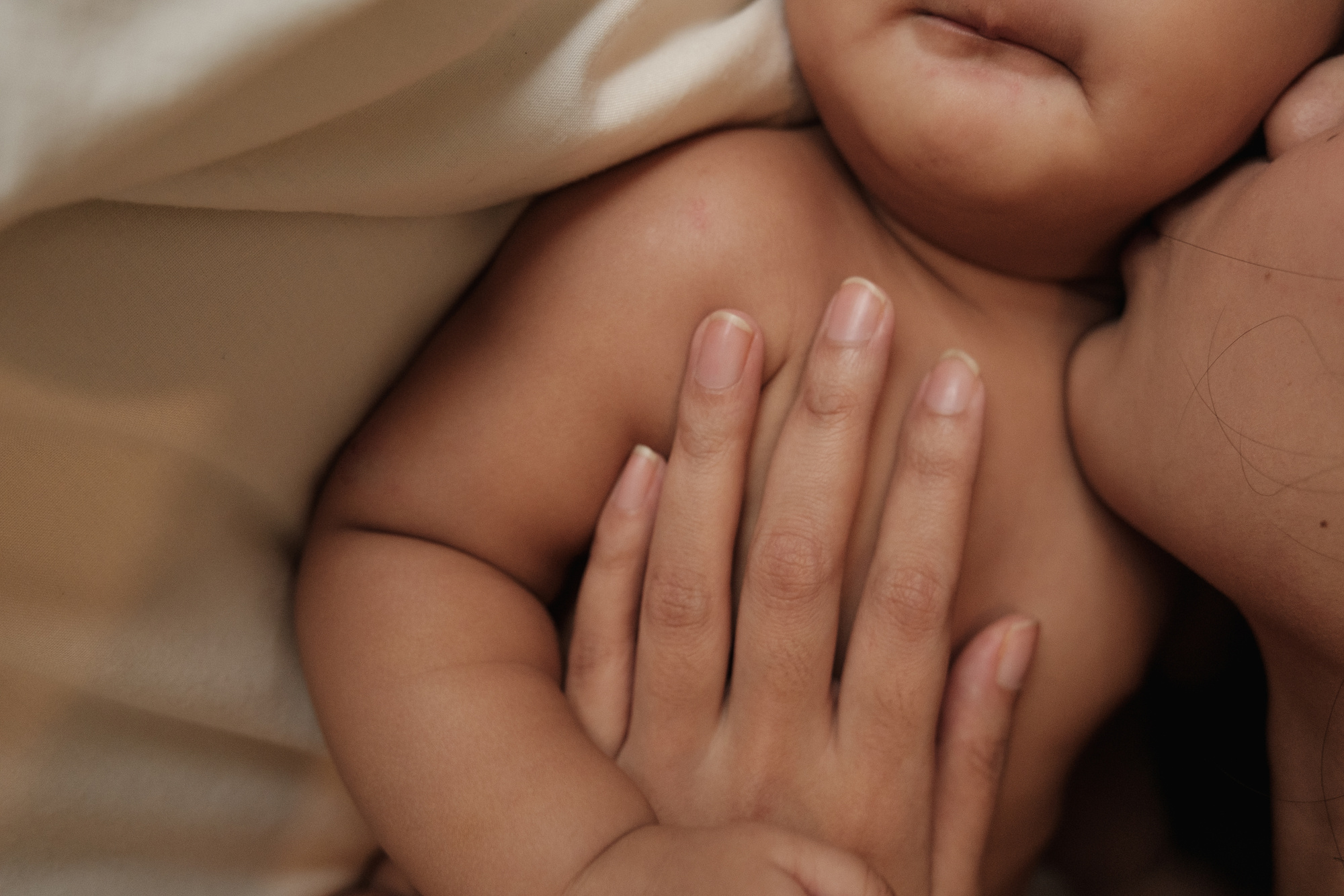 Mother Kissing Her Baby